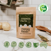 Package of 'low FODMAP Essential Herbs' by 'Friendly Blends' on a kitchen counter with vegetables in the background.