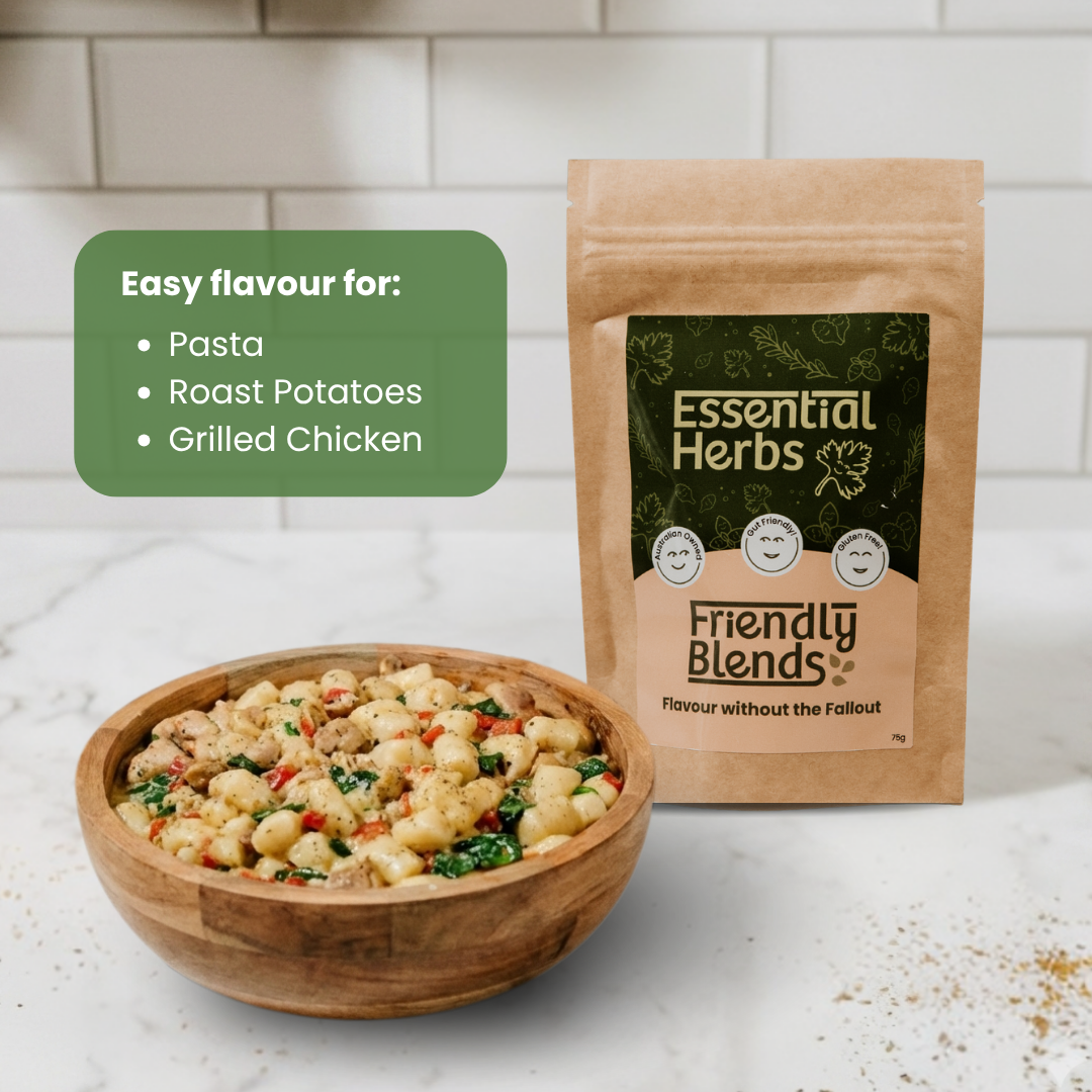 Bowl of pasta with a packet of 'Essential Herbs Friendly Blends' on a white surface.